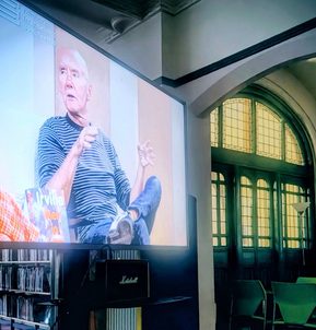 Photo of projection of Irvine Welsh talking at the Book Festival