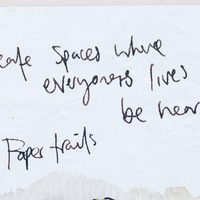 Artwork with writing that says 'create spaces where everyone's lives can be heard'