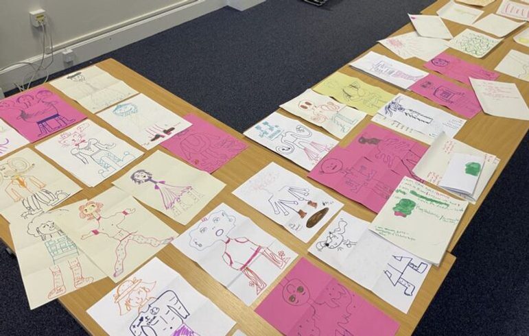 Various artworks displayed on a table