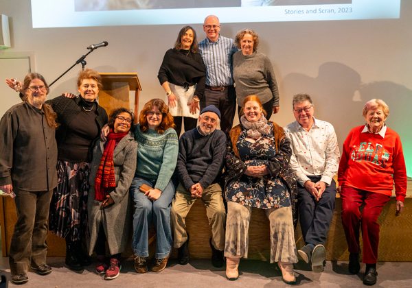 Citizen Writing Group sitting on stage