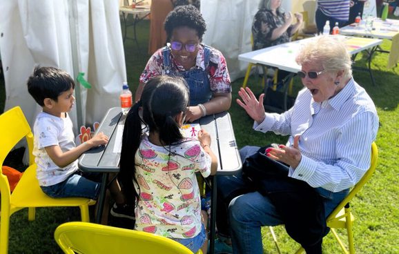 Group of people sitting around a table