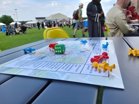 Board game with dice on an outdoor table