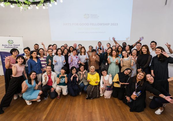 Large group in front of a projected screen