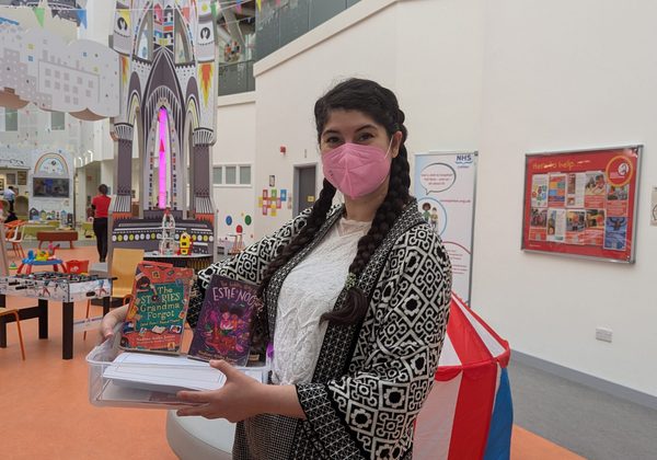 Photo of author Nadine Aisha Jassat wearing a mask at Edinburgh Sick Kids