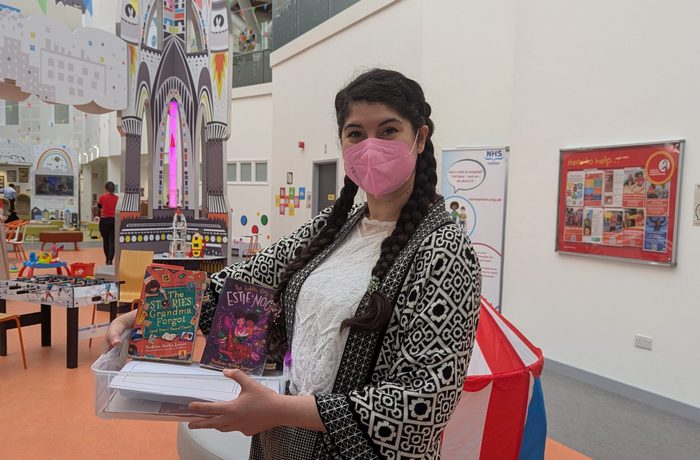 Photo of author Nadine Aisha Jassat wearing a mask at Edinburgh Sick Kids