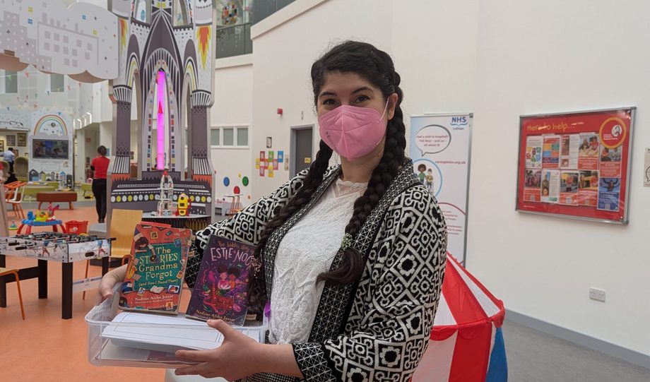 Photo of author Nadine Aisha Jassat wearing a mask at Edinburgh Sick Kids