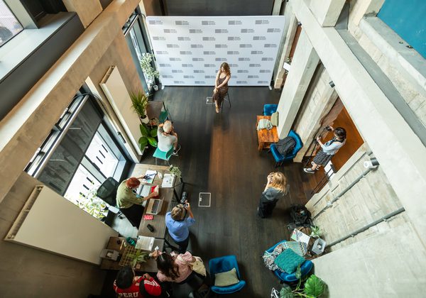 A photoshoot happening in the Book Festival press area photographed from above