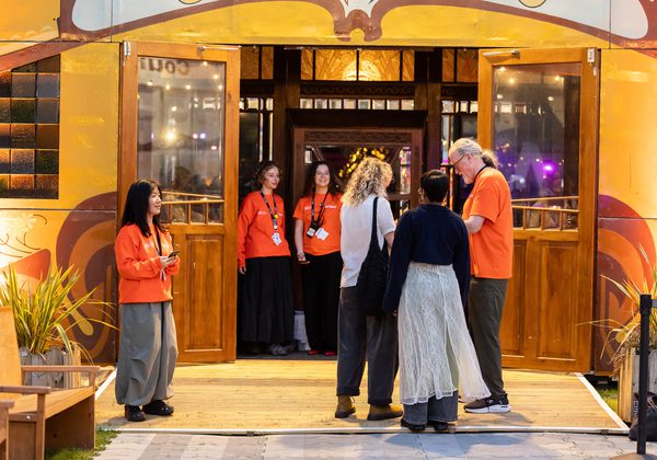 Front of house team members outside Spiegeltent
