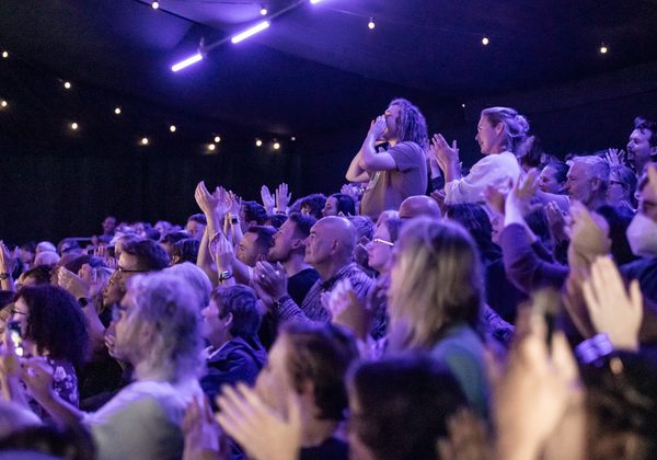 Audience applauding during an event at the Book Festival