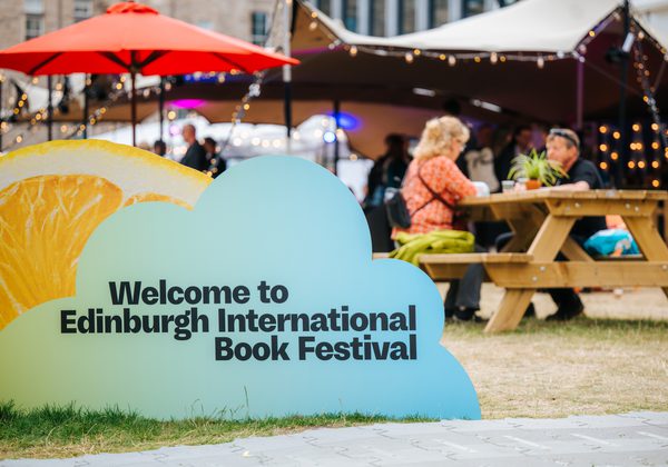Sign saying welcome to Edinburgh International Book Festival in the courtyard