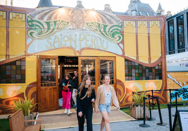 Audience walking out of Spiegeltent